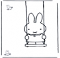 Little rabbit on swing